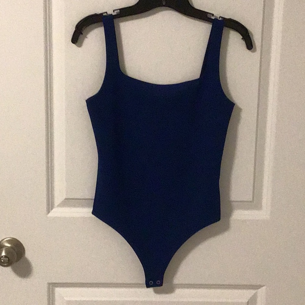 Express thing body suit never worn